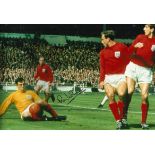 Ray Wilson signed 12x8 colour England action photo. Good Condition