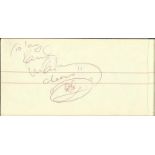 Paul McCartney signed autograph page. Dedicated to Ian. Has added a face doodle to the signature.