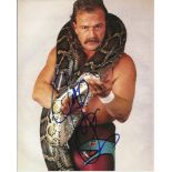 Jake “The Snake” Roberts signed 10x8 colour photo. Good Condition