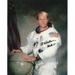 Al Worden signed colour 10x8 spacesuit photo. Good condition