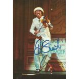 Tommy Steele pair of 6 x 4 and 10 x 8 signed photos, larger dedicated. Good condition Est. œ10 - 15