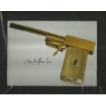 Christopher Lee signed 8 x 6 colour photo of the Golden Gun from James Bond Movie Gold finger matted