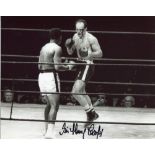 Henry Cooper - 8x10 inch photo signed by the late Henry Cooper pictured during his fight with