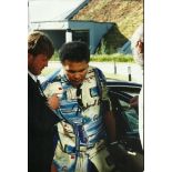 Muhammad Ali signed 12 x 8 colour photo. More recent image showing signs of ill health. Good