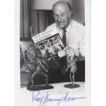 Ray Harryhausen. Signed 7”X5” picture with one of his models.. Excellent.