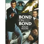 Roger Moore signed Bond on Bond the ultimate book on 50 years of Bond movies. Signed on inside title