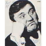 Les Dawson. A dedicated p/c sized signed picture of a rather bored looking Les Dawson. Excellent.