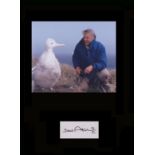 Sir David Attenborough. Signature with nature picture. Professionally mounted in black to 16”x12”.