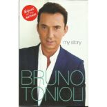 Bruno Tonioli signed My Story hardback book. Signed on inside title page. Good condition