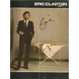 Eric Clapton signed to front of tour brochure, also signed inside. Good condition