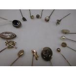 A small collection of 15 gemset and plain stickpins