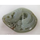 A jade stone carved with a phoenix, 10.5cm
