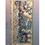 A 17th century crewel work frieze, the central panel depicting a landscape containing a dog, a