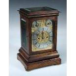 A good 19th century rosewood mantle clock signed Simmons, Coleman Street, London, the bevelled