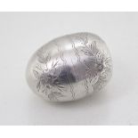 A Russian silver egg shaped box, St Petersburg, marks circa 1890, maker Nikolay Kemper, the body