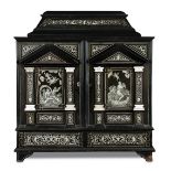 A 19th century South German ebony and ivory inlaid table cabinet, 17th century style possibly