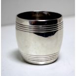 A small Victorian silver tot cup, by George Fox, London 1871, barrel shaped with two reeded