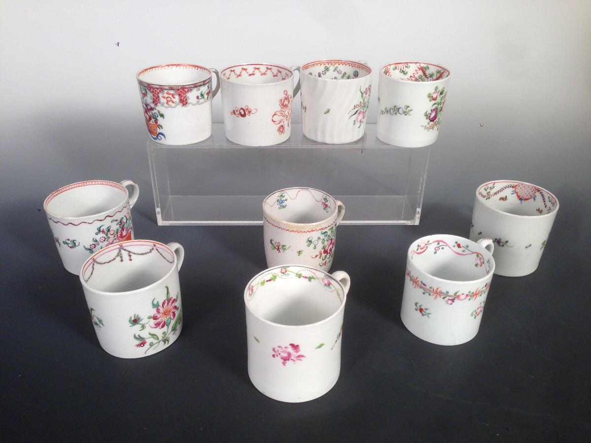 Six New Hall coffee cans, two by Keeling and two others, each painted with chinoiserie flowers,