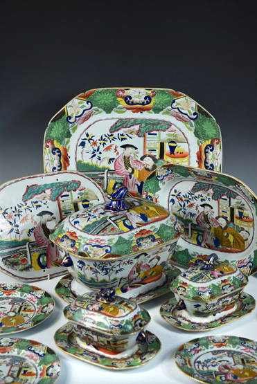 An early 19th century Mason's Ironstone part service, each piece decorated with a mandarin taking