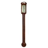 J. Della Torre, Perth, a George III walnut stick barometer, the silvered register above exposed