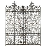 A pair of late 18th / early 19th century wrought iron gates in the Venetian manner 242 x 204cm (94 x