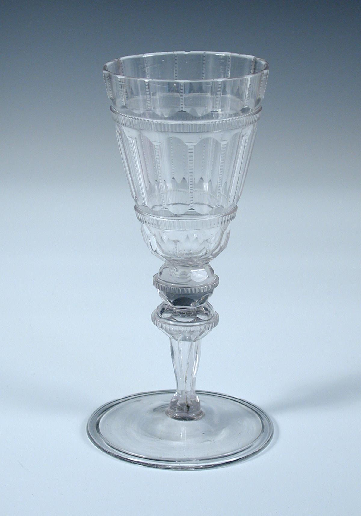 An 18th century soda glass, the conical bowl cut with facets and milled bands, the double knopped - Image 2 of 3