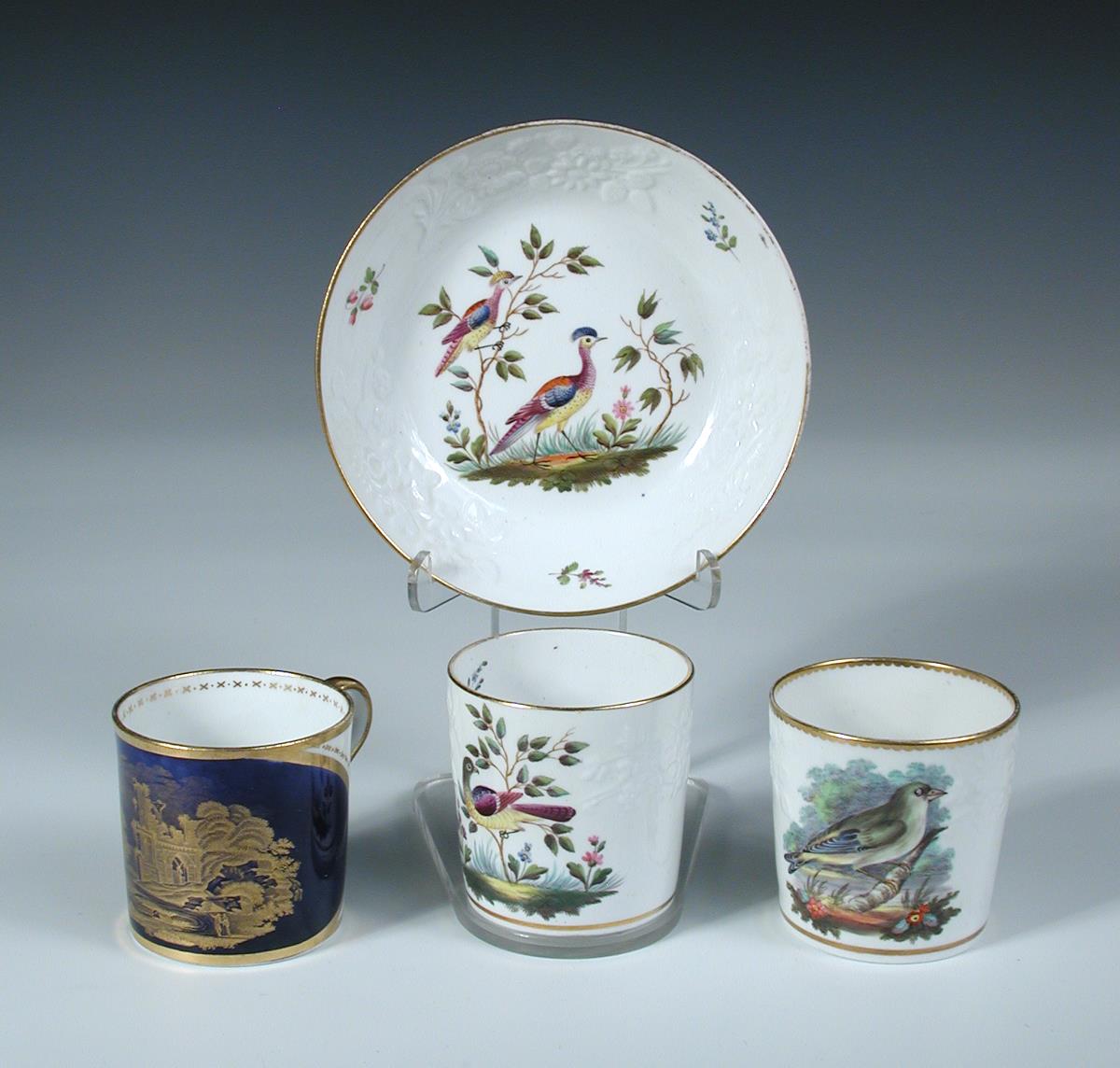 A Coalport trio, a can and saucer and a single can, the first painted with ruins in a landscape, the - Image 3 of 3