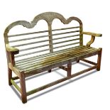 A Lutyens style teak garden bench, with shaped crest rail back 107 x 158 x 55cm (42 x 62 x 21in)