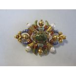A Renaissance revival enamel, hardstone and pearl brooch, of pierced form with a central oval