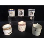 A Spode Armorial coffee can and five others, the former with the motto 'Avauncez et Archez Bien' and