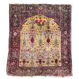 A Feraghan part silk prayer rug, late 19th century the central mirab with hanging baskets and floral