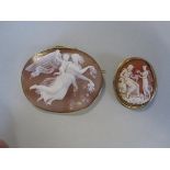 Two shell cameo brooches depicting classical gods, the first depicting Eos, winged goddess of the