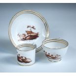 Attributed to Chamberlain's Worcester, a miniature trio of tea cup, coffee can and saucer, each
