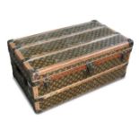 An early 20th century Louis Vuitton cabin trunk, circa 1925, brass bound with repeated LV