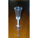 An 18th century opaque twist ale glass, the tall slender conical bowl and stem on circular foot,