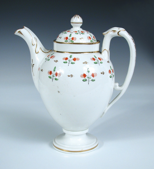 An early 19th century Pinxton style coffee pot and cover, painted with red floral sprigs on a