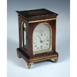 William Cribb, London, a Regency rosewood and brass mounted timepiece of small proportions, the