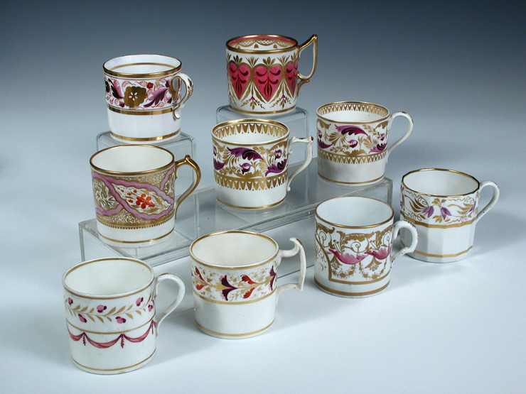 Sixteen early 19th century coffee cans decorated with similar colour palette of pinks, purples and