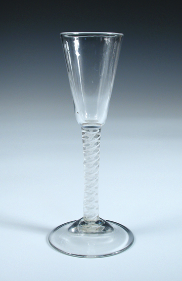 An 18th century opaque twist wine glass, the slender conical bowl on double helix stem and