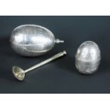 A Russian silver campaign egg cup and sectional silver gilt egg spoon, St Petersburg, circa 1890,