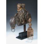 A Bamana Sogo Bo marionette and a Luba, Congo comb, the first with twin figures riding a horse,