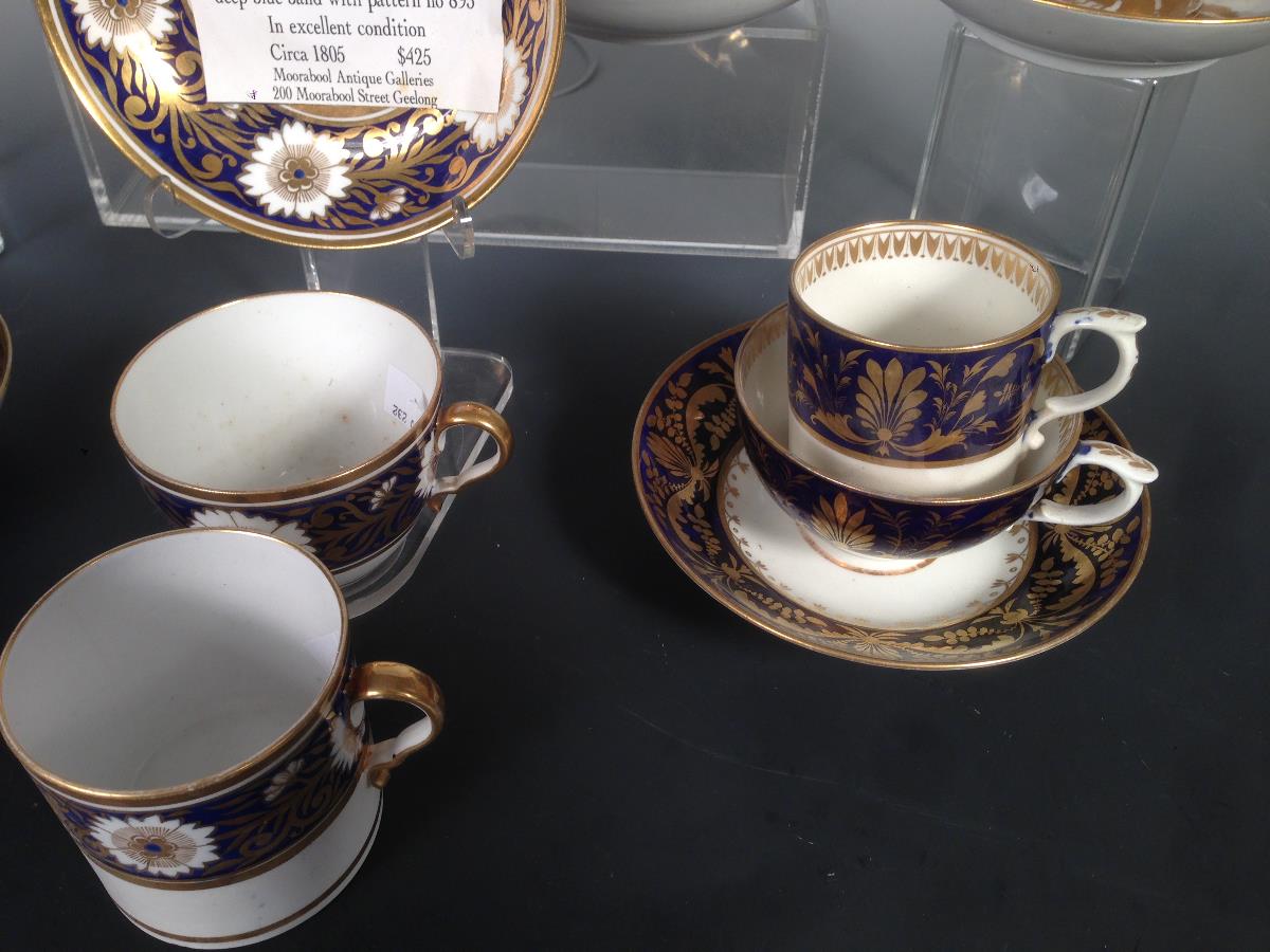 Eight early 19th century coffee cans and saucers, some with additional cups, all decorated with blue - Image 4 of 4