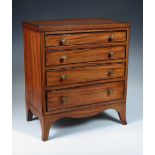 An early 19th century satinwood miniature chest of drawers, the four graduated crossbanded drawers