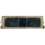 A gilt framed overmantle mirror, early 18th century with triple plate and gesso moulded leaf and