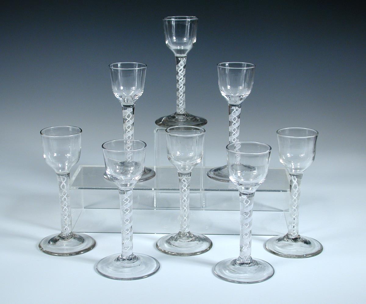 A set of eight 18th century opaque twist glasses, the slightly tapering cylindrical bowls on - Image 2 of 2