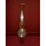 J.Kemp ,Wakefield, a mahogany wheel barometer, 19th century, the broken arch pediment above silvered