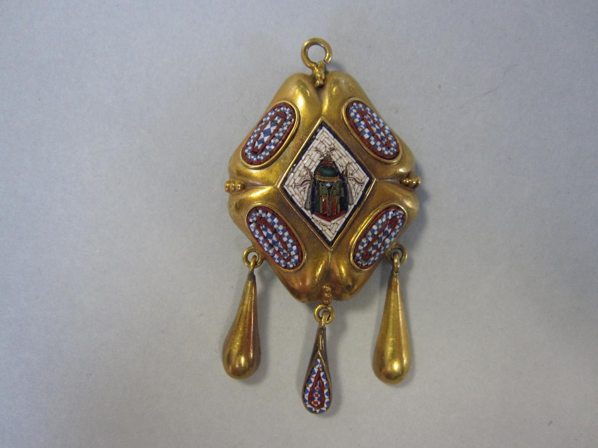 A mid 19th century Archeological revival micromosaic pendant, of diaper quatrefoil boss form with