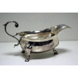 A small George II silver sauce boat, probably by George Hunter, London 1753, oval with cut edges