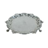 A George II silver salver, by William Peaston, London 1751, circular with moulded shell scrolled