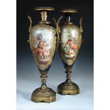 A pair of late 19th century/early 20th century Sevres porcelain vases, painted by Jean Armand with